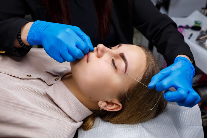 Flawless 15-Minute Upper Lip Threading Experience at The Qalm Spa & Salon - Indore Marriott Hotel