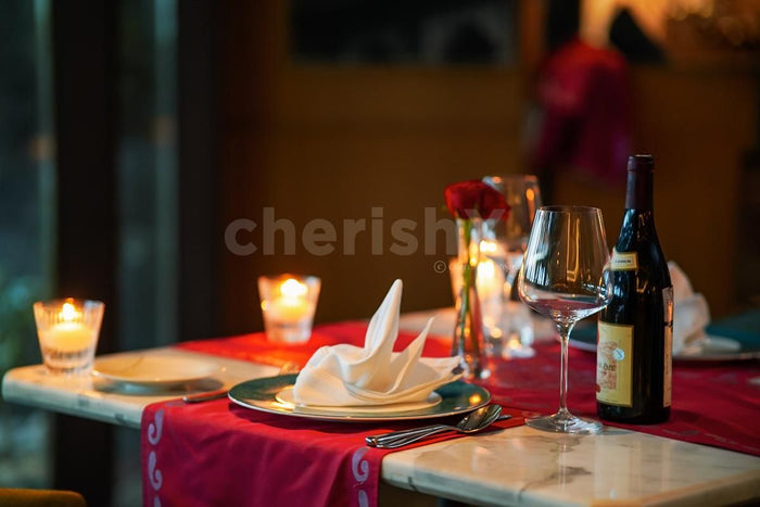 Indoor candlelight dinner at Dilli 32, The Leela Ambience Convention Hotel, Delhi