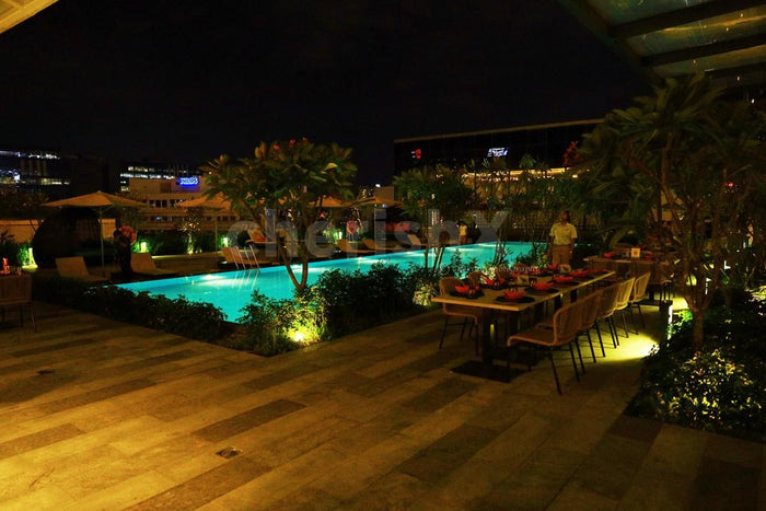 Exotic Poolside Candle Light Dinner - Hilton by Manyata