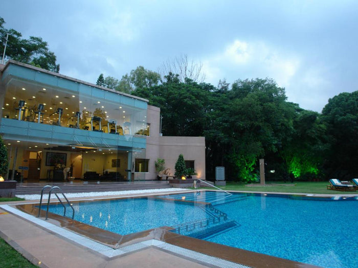 Elegant Multi-Cuisine Private Cabana Garden Candlelight Dinner Experience for Two at The Lalit Bangalore in Bengaluru