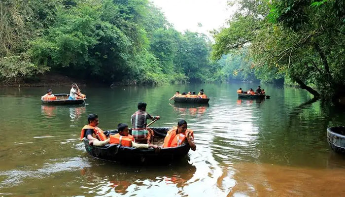 Scenic Traditional Coracle Ride in Kerala by Bond Safari Kovalam