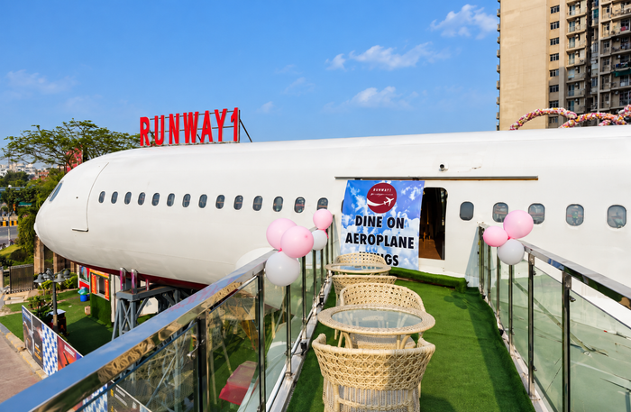 Runway1 - Immersive Airplane-Themed Dining Experience for Two at 2 Locations in Delhi NCR