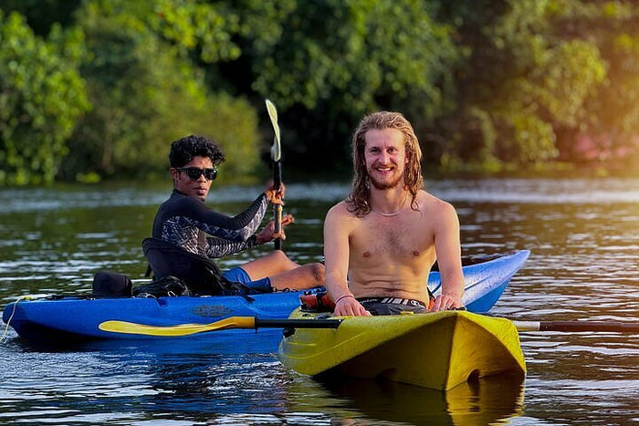 Scenic Freshwater Kayaking Experience in Kovalam