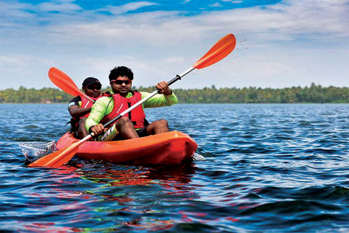 Scenic Freshwater Kayaking Experience in Kovalam