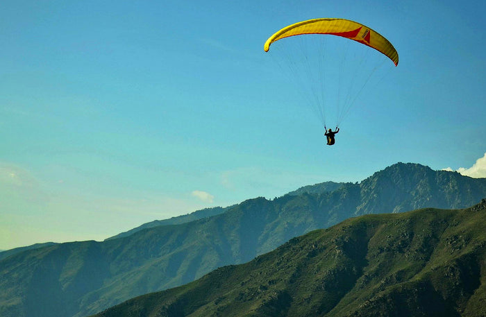 Soaring 10-Minute Tandem Paragliding Adventure Over Kashmir with Free Video