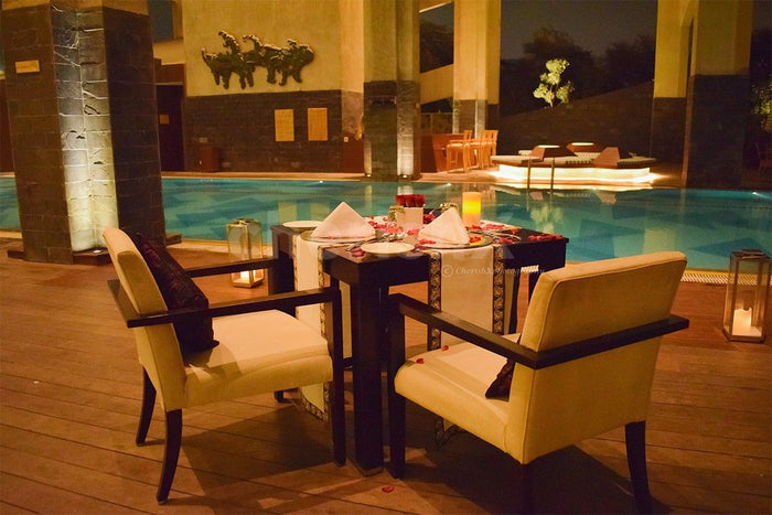 Poolside Dinner by Taj