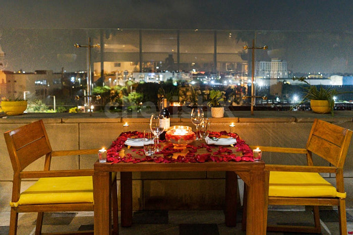 Open air deck dining by The Leela