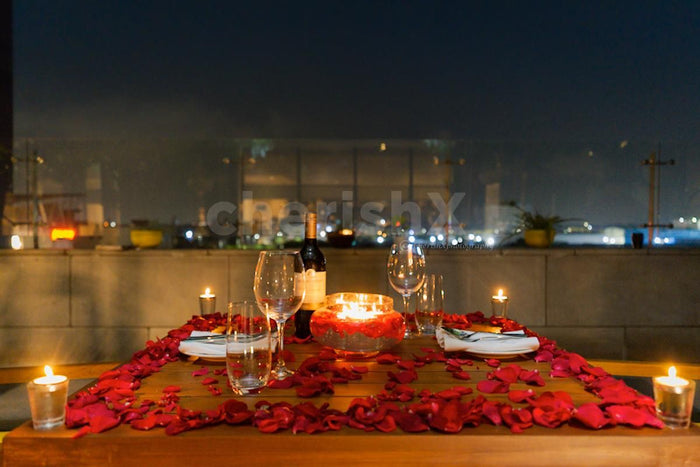 Open air deck dining by The Leela