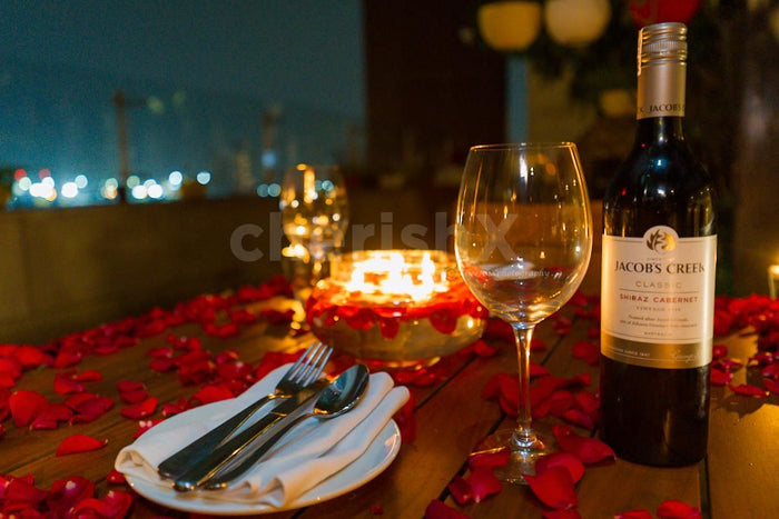Open air deck dining by The Leela