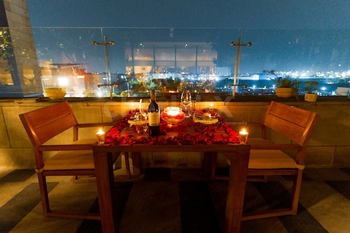 Open air deck dining by The Leela