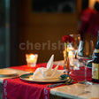 Indoor candlelight dinner at Dilli 32, The Leela Ambience Convention Hotel, Delhi