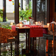 Indoor candlelight dinner at Dilli 32, The Leela Ambience Convention Hotel, Delhi