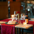 Indoor candlelight dinner at Dilli 32, The Leela Ambience Convention Hotel, Delhi