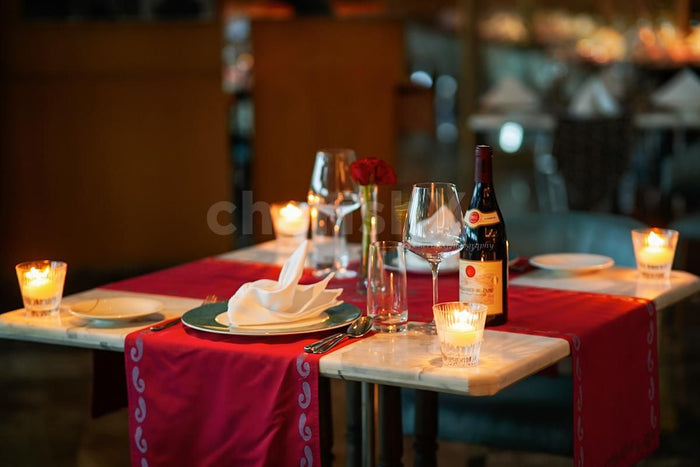 Indoor candlelight dinner at Dilli 32, The Leela Ambience Convention Hotel, Delhi