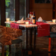 Indoor candlelight dinner at Dilli 32, The Leela Ambience Convention Hotel, Delhi