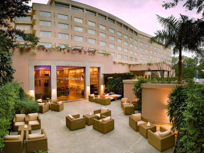 Elegant Multi-Cuisine Private Cabana Garden Candlelight Dinner Experience for Two at The Lalit Bangalore in Bengaluru
