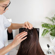 Luxurious Hair Spa and Anti-Dandruff Treatment at The Qalm Spa & Salon - Indore Marriott Hotel