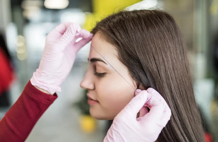Smooth 15-Minute Solo Forehead Threading Experience at The Qalm Spa & Salon - Indore Marriott Hotel