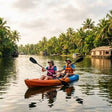 Scenic Freshwater Kayaking Experience in Kovalam