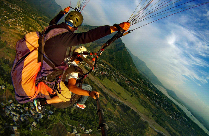 Soaring 10-Minute Tandem Paragliding Adventure Over Kashmir with Free Video